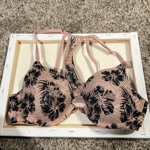 This is a pink bra that is multi colored. It is a size 32C and is comfortable.